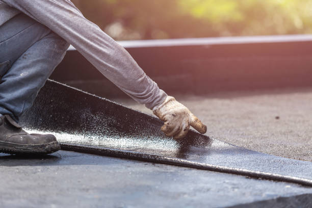 Professional Basement Waterproofing technician working in Cambridge, WI